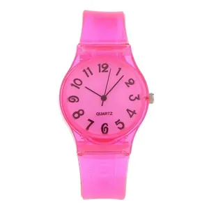 Detailed macro view of a pink transparent silicone jelly watch with clear Arabic numerals