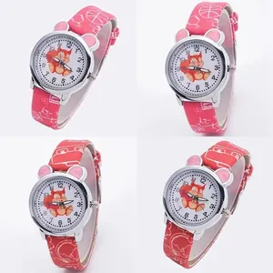 Multiple angles of a pink quartz watch with a cute squirrel dial and animal ears