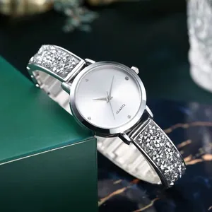 Elegant silver quartz watch for women with diamond-encrusted steel strap and sunray dial