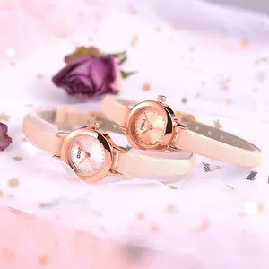 Elegant DGG women's quartz watch set with rose gold casing and light leather straps