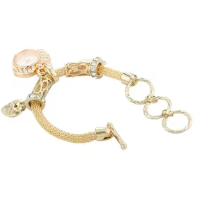 Orologio al quarzo a maglia dorata da donna con strass e ciondolo a forma di cuore