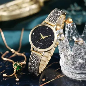 Women's starry sky quartz watch with gold steel band and sparkling rhinestone accents