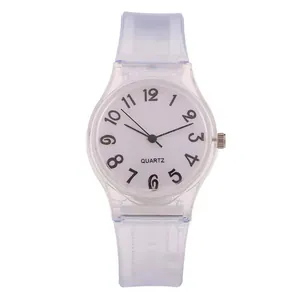 Detail of transparent silicone jelly watch with white dial and clear black numerals