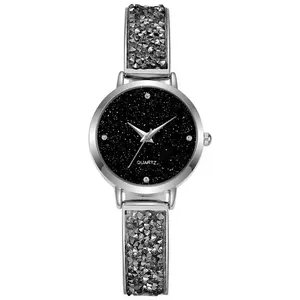 Elegant women's silver quartz watch with starry black dial and crystal encrusted strap