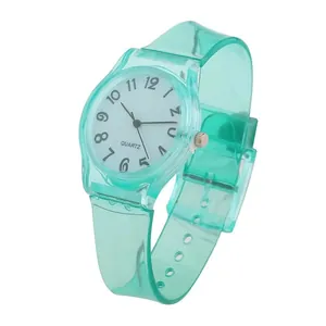 Side profile of mint green jelly watch showing the transparent strap and white quartz dial