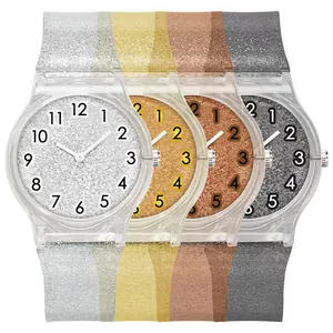 Detail showing four stylish glitter watches with transparent straps and numeric dials