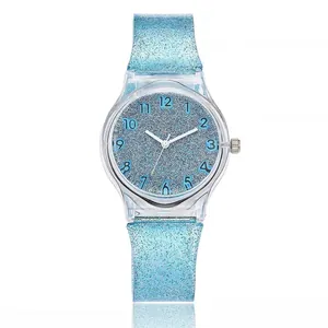 Close-up of sky blue glitter watch with Arabic numerals and clear plastic case