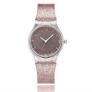 Pink glitter Geneva quartz watch for women featuring silicone strap and numeric dial