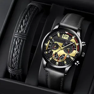 Close-up of classic men's business watch set with leather strap and braided bracelet