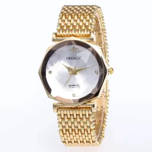 Orologio al quarzo dorato da donna con vetro taglio diamante e indici in strass