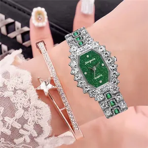 Luxury women's quartz watch with green octagonal dial and star charm bracelet set