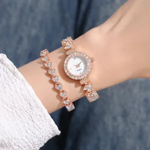 Elegante set orologio al quarzo in oro rosa e bracciale a cuore con cristalli lucidi