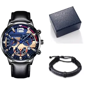 Detail view of men's blue quartz watch with black leather strap and woven bracelet in box