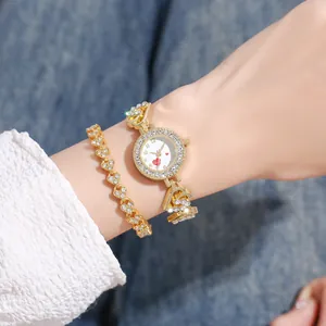 Elegant gold watch and heart bracelet set with rhinestones and love motif