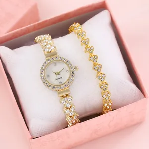 Set orologio al quarzo dorato da donna con castone di strass e bracciale a forma di cuore