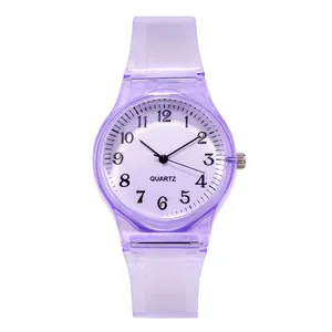 Detail of purple translucent silicone watch with white dial and black Arabic numerals