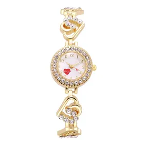 Women's gold quartz watch set with crystal heart bracelet and elegant white love dial