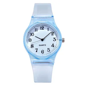 Detail of light blue translucent silicone watch with quartz movement and numeric dial