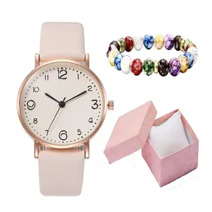 Coffret montre femme avec bracelet en cuir rose, gourmette et boîte cadeau élégante