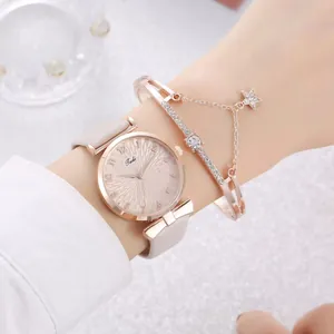 Elegant rose gold women's watch with pink dial and matching star pendant bracelet