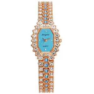 Luxury rose gold square watch for women with rhinestones and star-textured blue dial