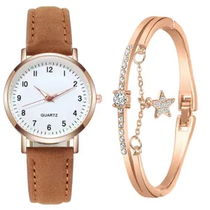 Dettagli dell'orologio al quarzo oro rosa con cinturino opaco e bracciale a stella coordinato