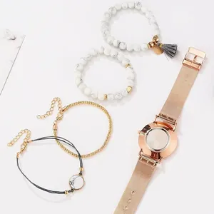 Ensemble bijoux femme avec montre or rose et bracelets en perles de marbre
