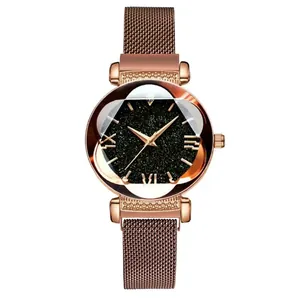 Detail of rose gold Milanese mesh band and starry sky dial with Roman numerals