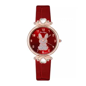 Women's red leather watch with rose gold case featuring a glitter rabbit and heart rhinestone