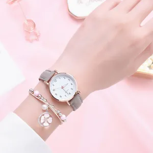Minimalist women's watch with gray leather strap and beaded floral bracelet set