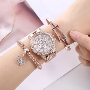Rose gold women's watch set with butterfly charm bracelet and sparkling crystals