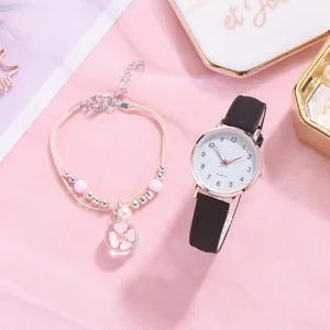 Women's quartz watch with black leather strap and floral bracelet set in pink gift style