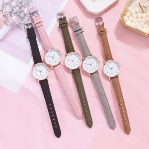 Five minimalist women's leather watches with rose gold cases and numbered dials