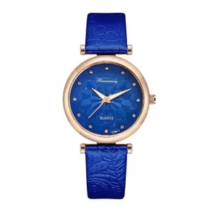 Macro view of blue starry watch dial with rose gold case and sparkling crystal markers