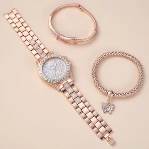 Elegant rose gold women's watch set with rhinestone bezel and butterfly pendant bracelet