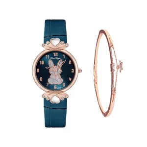 Detailed set featuring a rabbit dial quartz watch and rose gold star charm bracelet