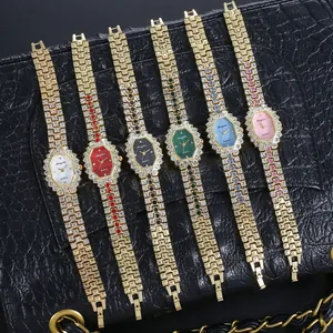 Montre à quartz octogonale pour femme avec strass et bracelet en alliage doré