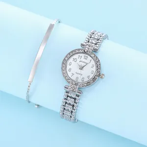 Orologio al quarzo di lusso argento con strass e set bracciale in metallo coordinato