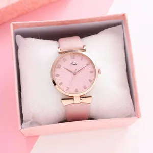 Pink Tadi leather strap watch with rose gold bow detail in a gift display box