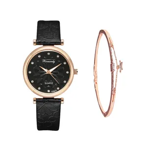 Close-up of elegant rose gold star bracelet and diamond cut dial quartz watch set