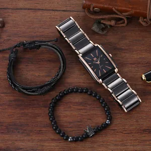 Business gift set featuring a square quartz watch with black leather and beaded bracelets
