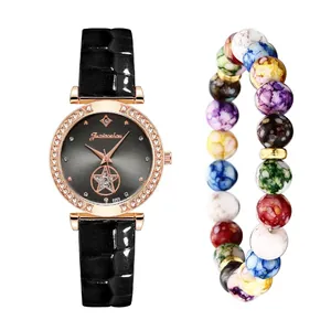 Close-up of ladies quartz watch with rhinestone bezel and colorful beaded bracelet