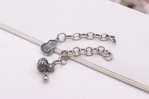 Macro shot of S925 sterling silver gourd pendant extension chain with lucky engravings