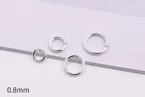 Detailed view of 0.8mm S925 sterling silver jump rings in various sizes for jewelry DIY