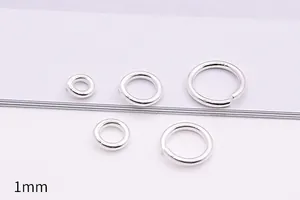 Macro view of five 925 silver DIY jump rings with 1mm wire thickness specification