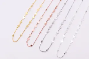 Detail of S925 sterling silver heart chain in gold, silver, and rose gold finishes