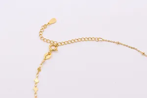 Macro shot of S925 sterling silver heart chain with spring clasp and extension tail