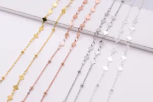 Detail of S925 sterling silver heart and bead chain in gold, silver, and rose gold