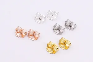 Detailed view of flower-shaped S925 sterling silver earring backs in four metallic finishes