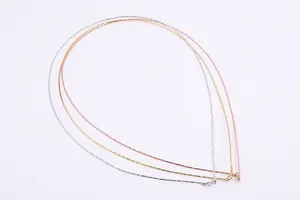 Detailed view of Italian S925 silver faceted chains in silver gold and rose gold finishes